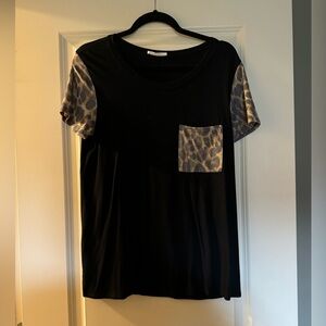Filly flair short sleeve top with animal print.